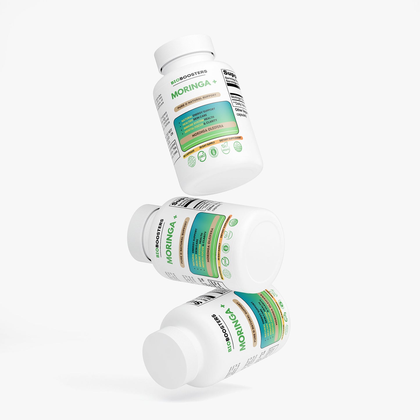 Three bottles of Moringa supplement on a white background
