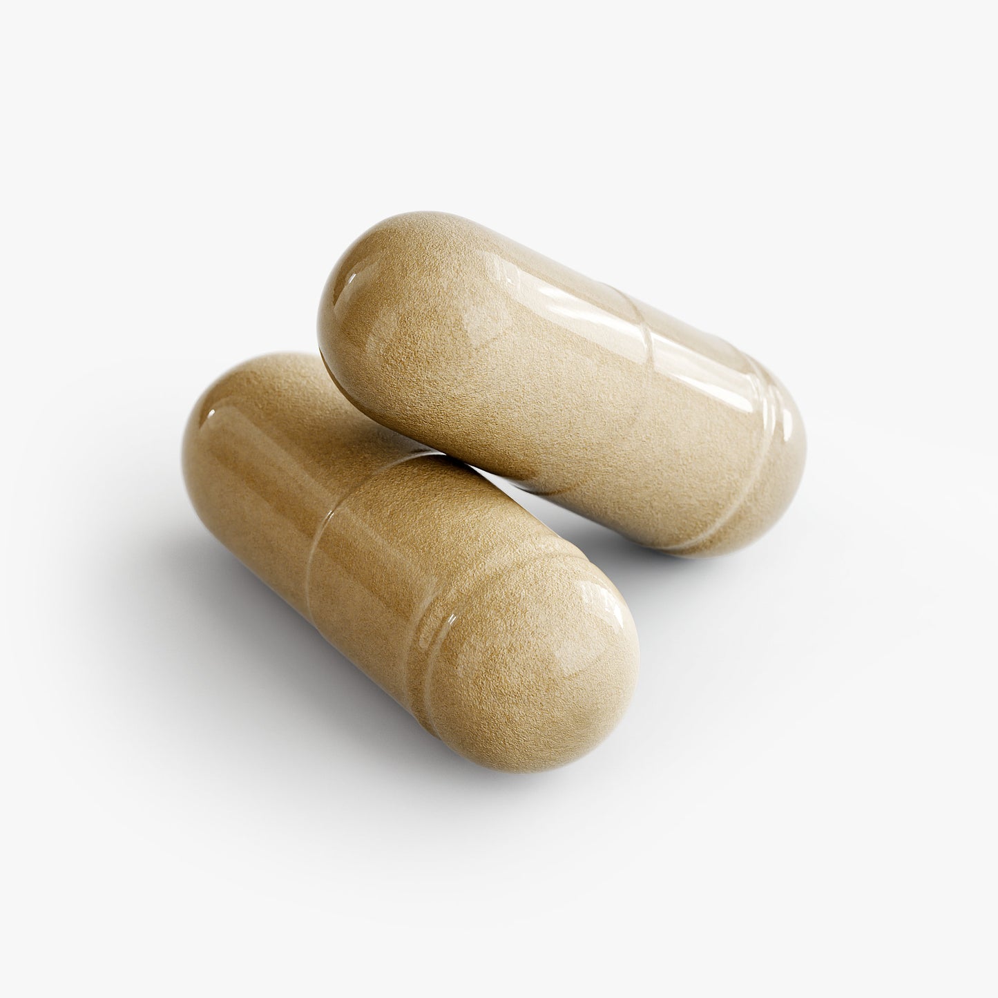 Two beige capsules on a white background